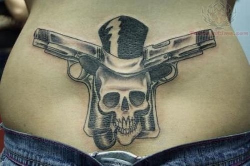 Hat Skull And Guns Lowerback Tattoo